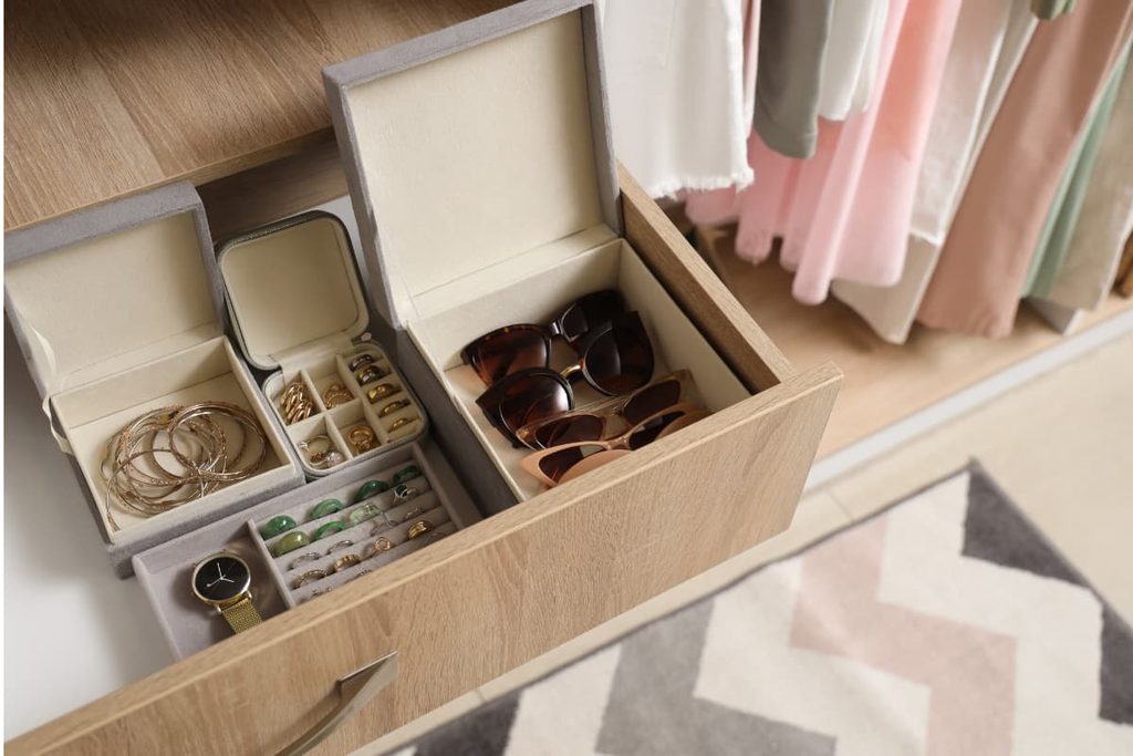 How to start organizing your home with a neatly arranged drawer for jewelry and sunglasses.